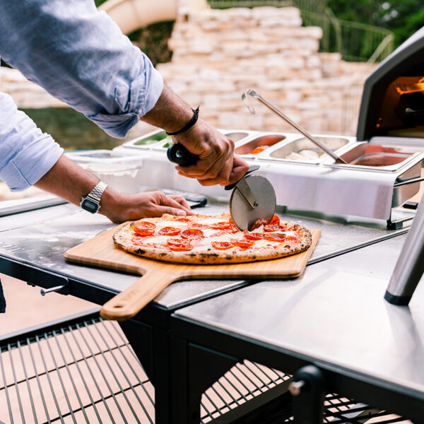 Ooni Professional Pizza Cutter Wheel in use
