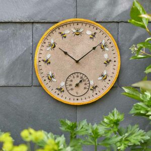 The Outside In 12-Inch Beez Wall Clock and thermometer in situ outdoors
