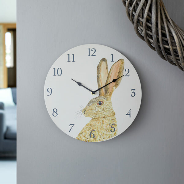 The Outside In 12-Inch Hare Wall Clock in situ indoors