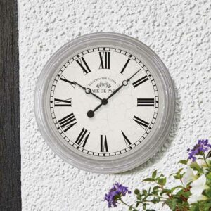 The Outside In 15-Inch Biarritz Wall Clock in situ outdoors