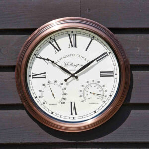 The Outside In 15-Inch Mollington Wall Clock in situ outdoors
