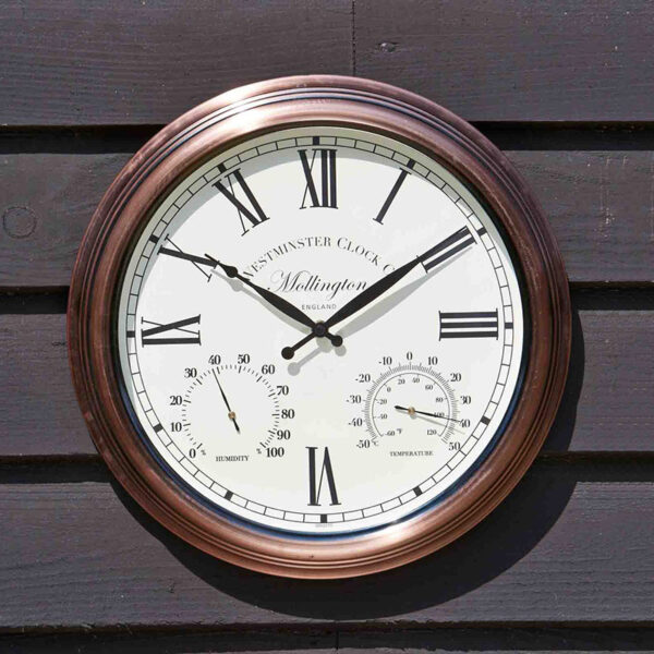 The Outside In 15-Inch Mollington Wall Clock in situ outdoors
