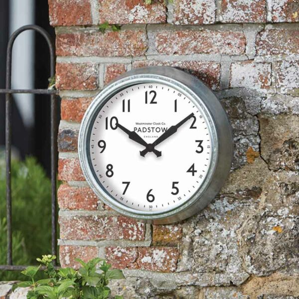 The 15-Inch Padstow Wall Clock in situ outdoors