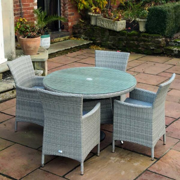 Supremo Barcelona 4-Seat Round Dining Set shown without parasol in use
