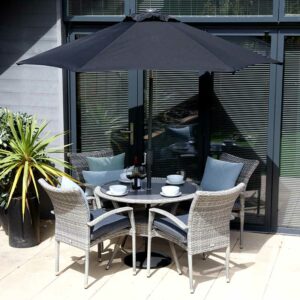 Supremo Leisure Iris 4 Seat Round Dining Set with Parasol & Base on patio