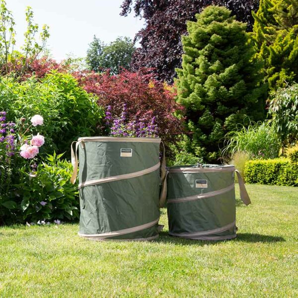 The large and small Town & Country Pop-Up Garden Tidy Bags sat next to each other on a lawn.