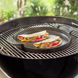 Enjoy lunch using the Weber Barbecue Gourmet BBQ System (GBS) Cast Iron Griddle Plate