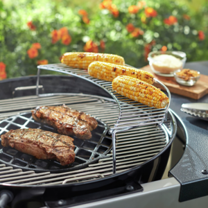 Use Weber Barbecue Warming Rack for 57cm charcoal barbecues #8417 to keep sides warm whilst the main finishes cooking
