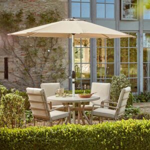 W Garden Living Bali 4 Seat Round Dining Set in Cotswold Antique Stone with Oatmeal Cushions & Parasol