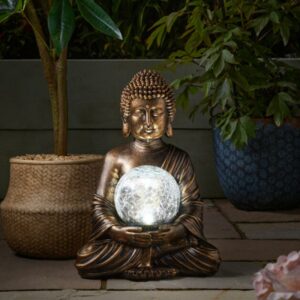 Smart Garden Gazing Buddha globe nighttime white glow lifestyle image