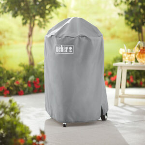 Close up of Weber Barbecue Cover for 47cm / 18″ Charcoal BBQs in use