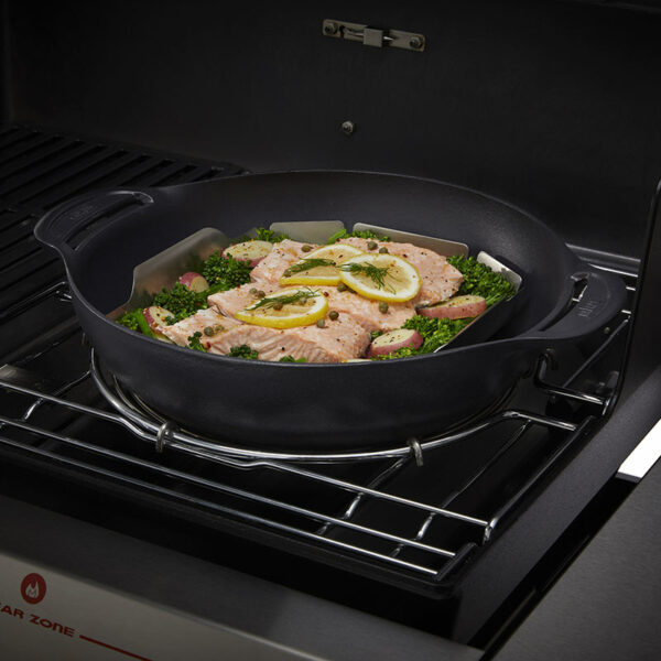 Weber Crafted Wok Set with Steaming Rack in use on gas barbecue steaming fish