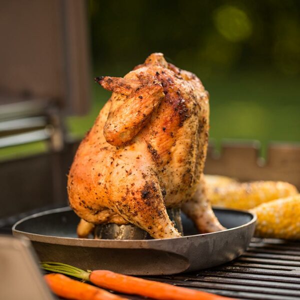 Weber Deluxe Poultry Roaster in use