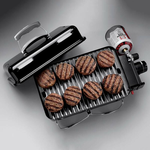 The Weber Go-Anywhere Portable Gas Barbecue in use cooking burgers