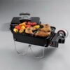 The Weber Go-Anywhere Portable Gas Barbecue in use grilling chicken and vegetables