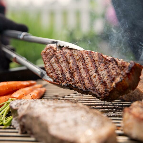 Weber Master-Touch Crafted Charcoal Grill BBQ in use cooking steak