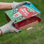 Westland Gro-Sure Smart Seed Fast Start (1kg) pouring from behind