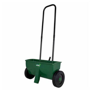A green Westland Drop Spreader with a very long handle, a small trough product holder and a narrow, accurate nozzle.