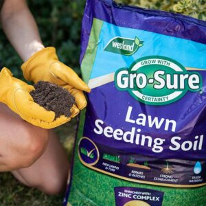Westland Lawn Seeding Soil lifestyle image with gloves